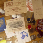 A case full of historical items from previous fairs in the State Fair Museum